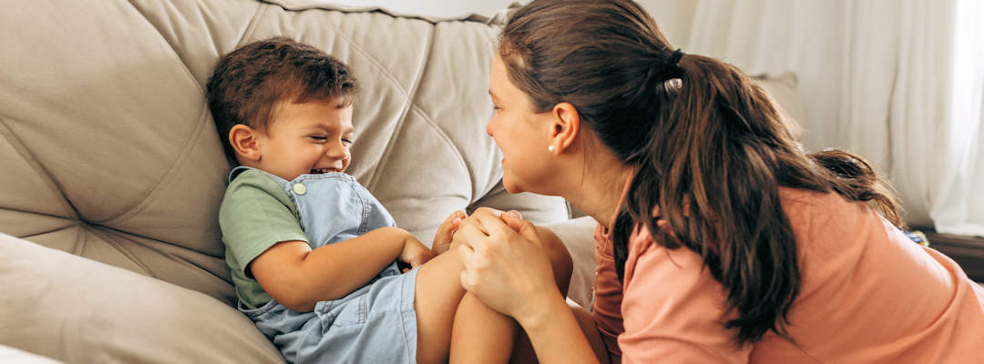 Woman playing with a little boy Woman playing with a little boy